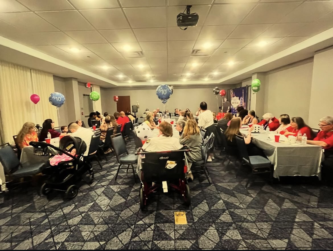 wide shot of the room of everyone at tables at the 2024 conference and convention banquet night.